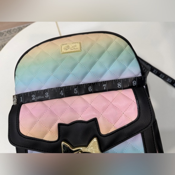 Betsey Johnson Quilted Pastel Rainbow Cat
Buckle Backpack Faux Leather